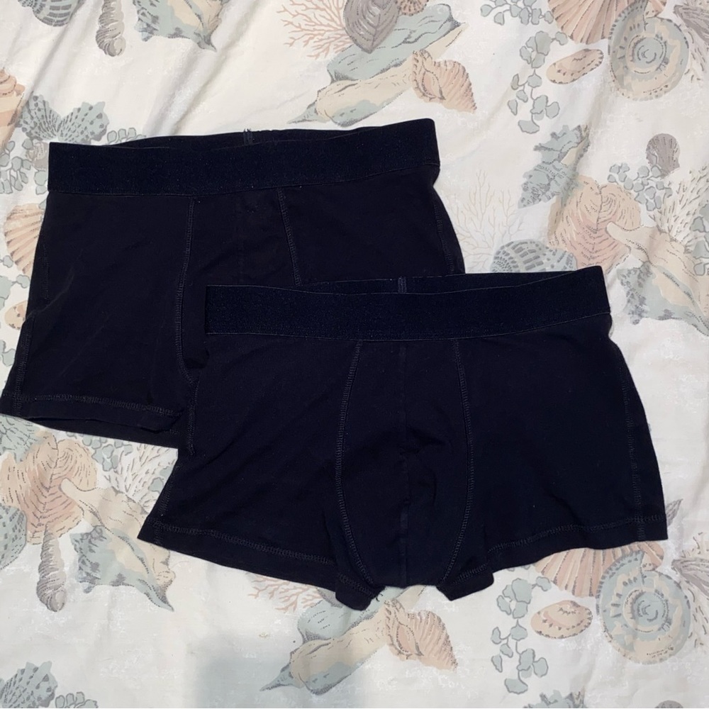 Two black H&M stretchy and breathable boxer shorts.